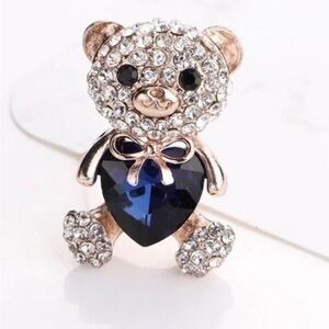 Elegant Sparkling Bear Brooch with Blue Heart